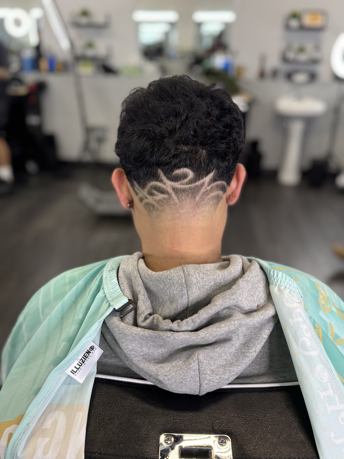 Detailed hair art design shaved into nape